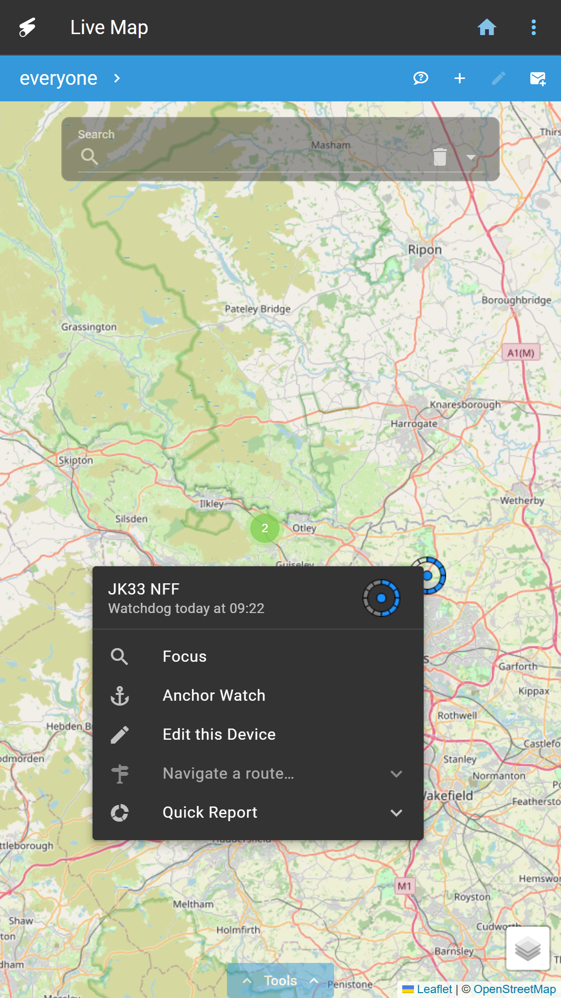 Phone screenshot of the Live Map over the Ripon and Harrogate area of North Yorkshire, with a pop-up for a device named JK33 NFF reading Watchdog today at 09:22, and options Focus, Anchor Watch, Edit this Device, Navigate a route and Quick Report.